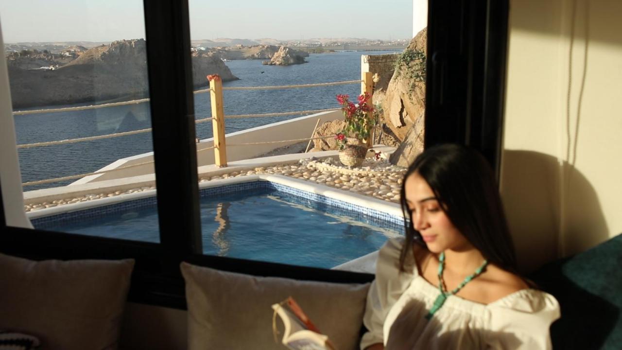 Benben By Dhara Hotels - Adults Only Aswan Bagian luar foto A woman meditating