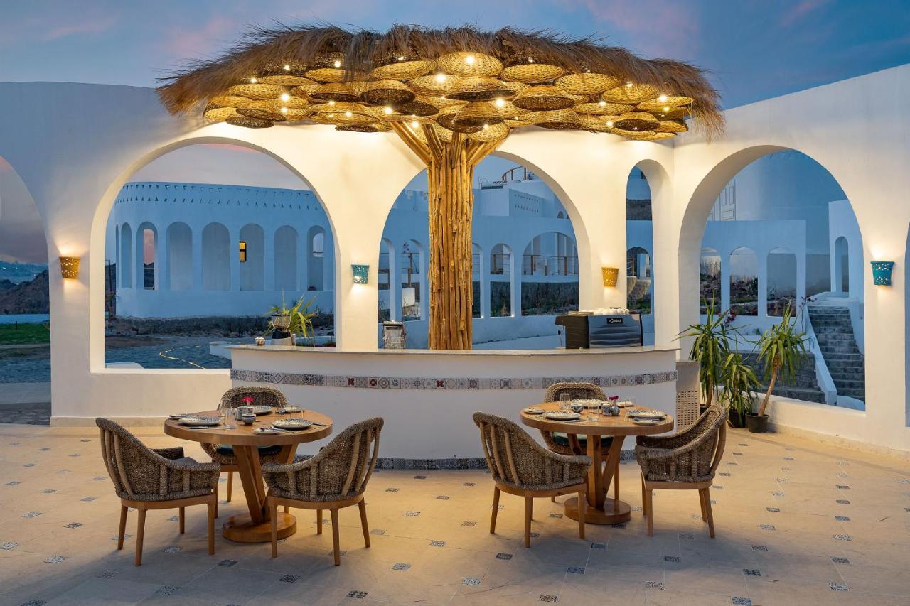 Benben By Dhara Hotels - Adults Only Aswan Bagian luar foto The restaurant at the hotel