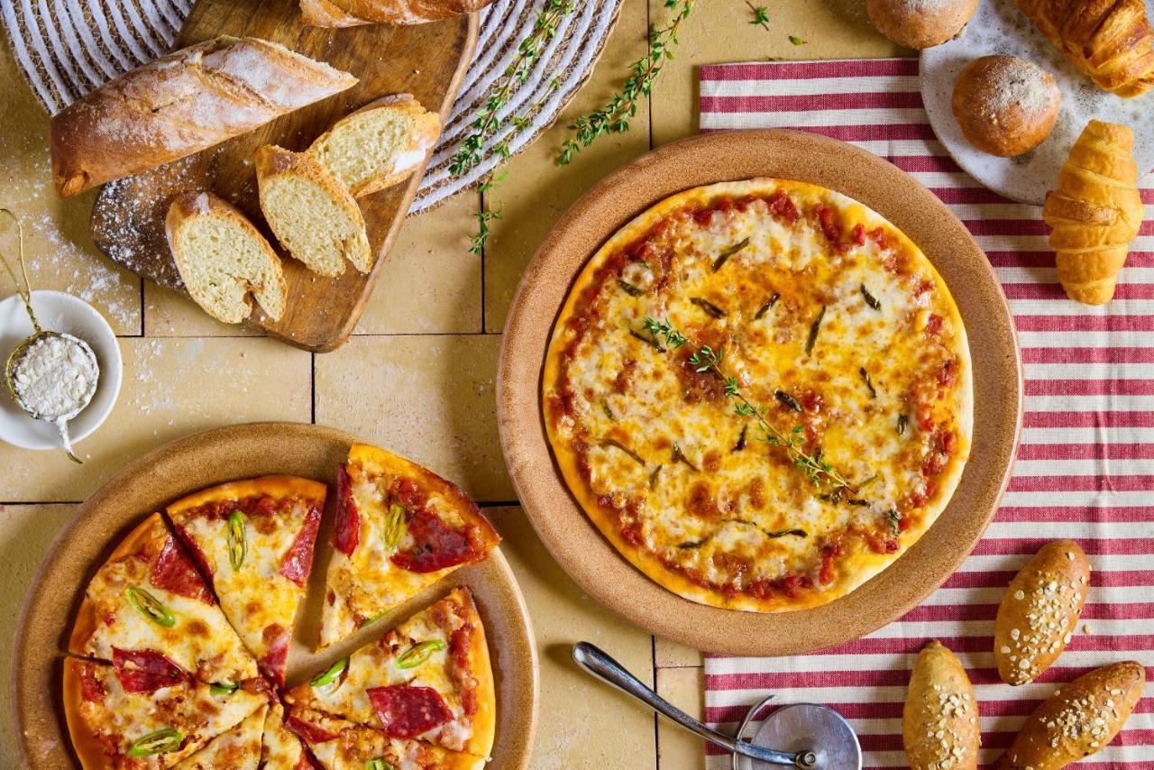 Benben By Dhara Hotels - Adults Only Aswan Bagian luar foto Pizza
