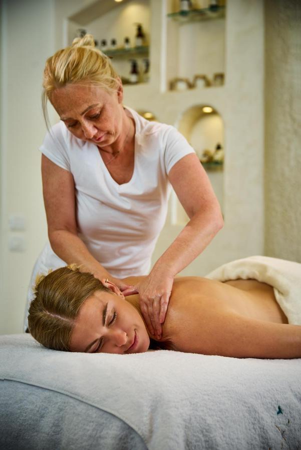Benben By Dhara Hotels - Adults Only Aswan Bagian luar foto A massage therapist treating a patient