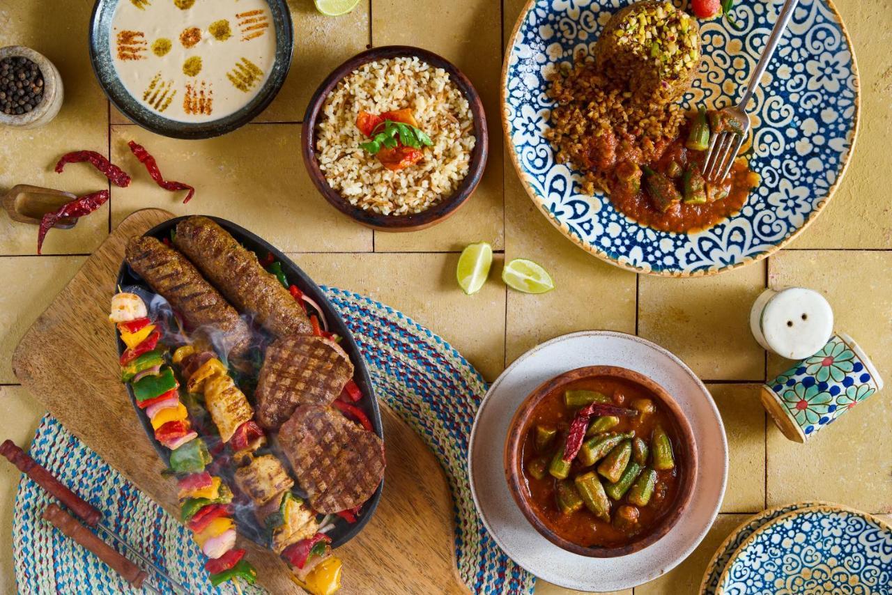 Benben By Dhara Hotels - Adults Only Aswan Bagian luar foto Moroccan cuisine