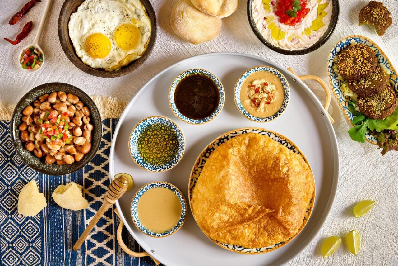 Benben By Dhara Hotels - Adults Only Aswan Bagian luar foto A typical breakfast in Tunisia